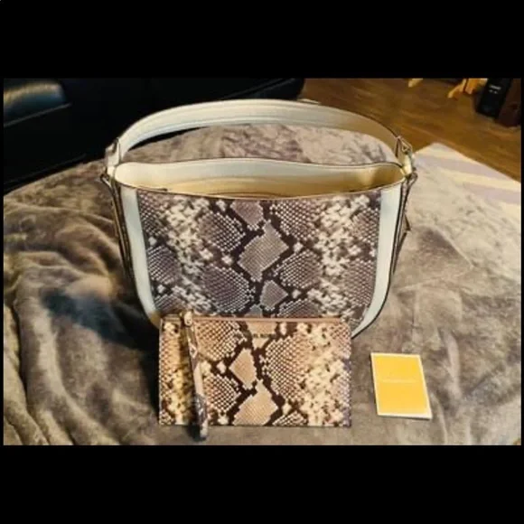 Michael Kors leather purse with matching zipper wallet. - Picture 2 of 5